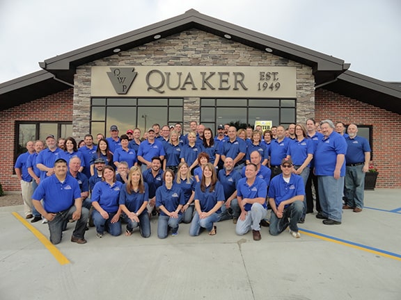 Quaker team outside headquarters